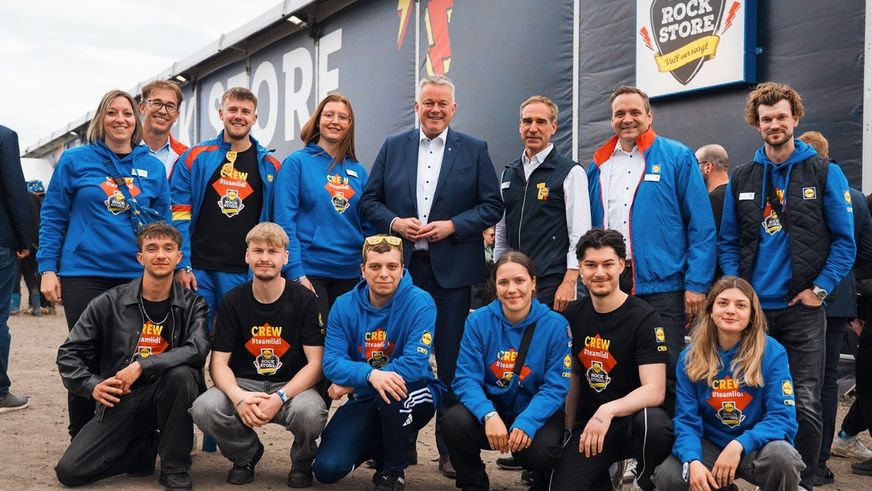 Rock am Ring: Ministerpräsident Schnieder besucht den Lidl Rock Store
